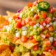 guacamole topped raw nachos